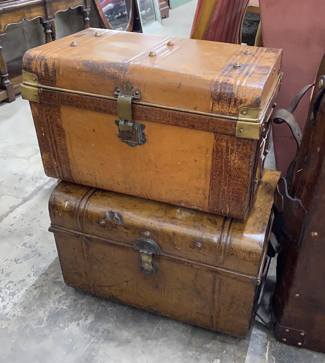 Two Victorian metal travelling trunks with painted grain, larger width 64cm, height 44cm